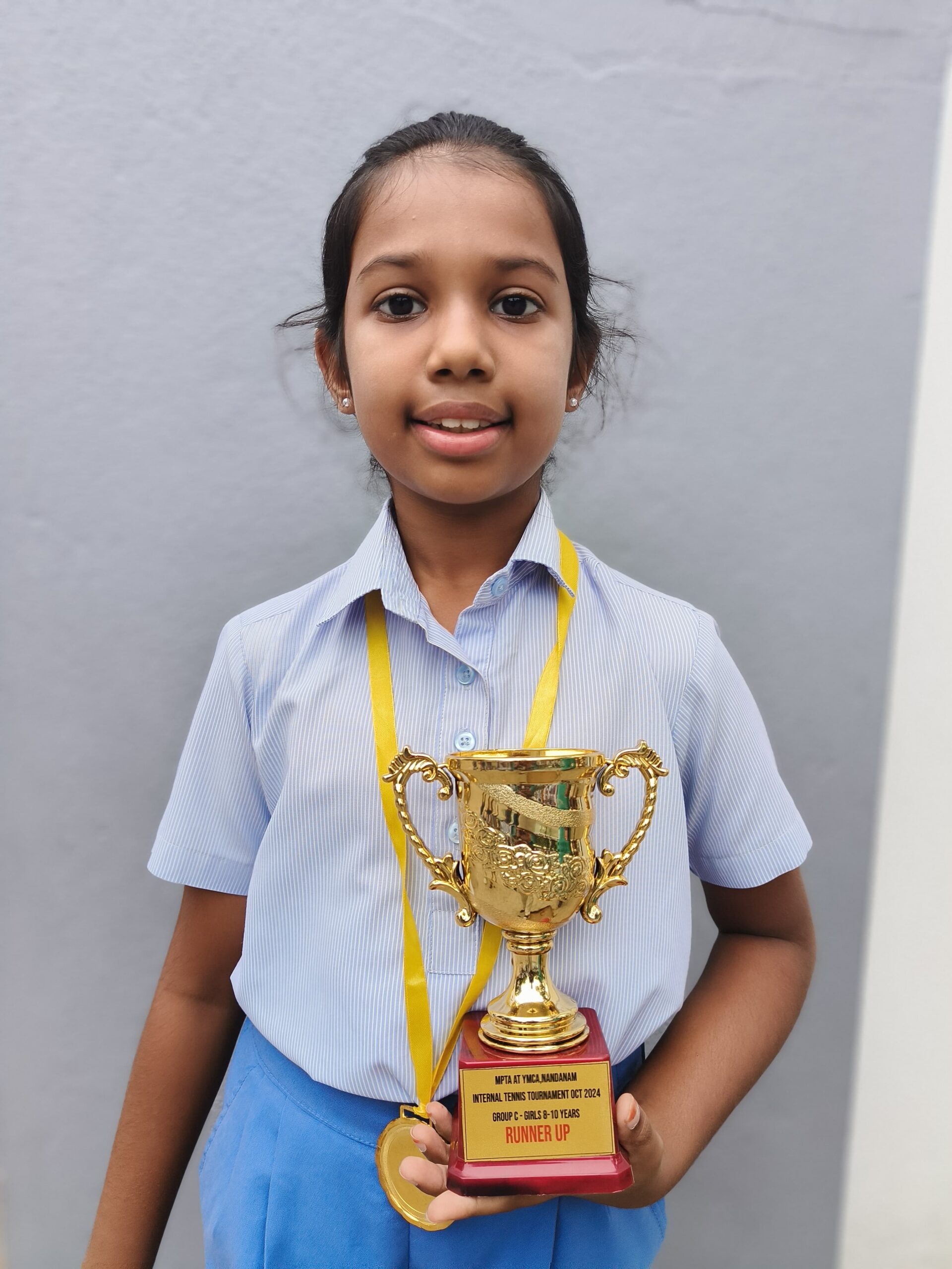 Aadhya Rajiv was the runner-up at YMCA TA Internal Tennis Tournament held in October 2024 for age group 8-10 years.