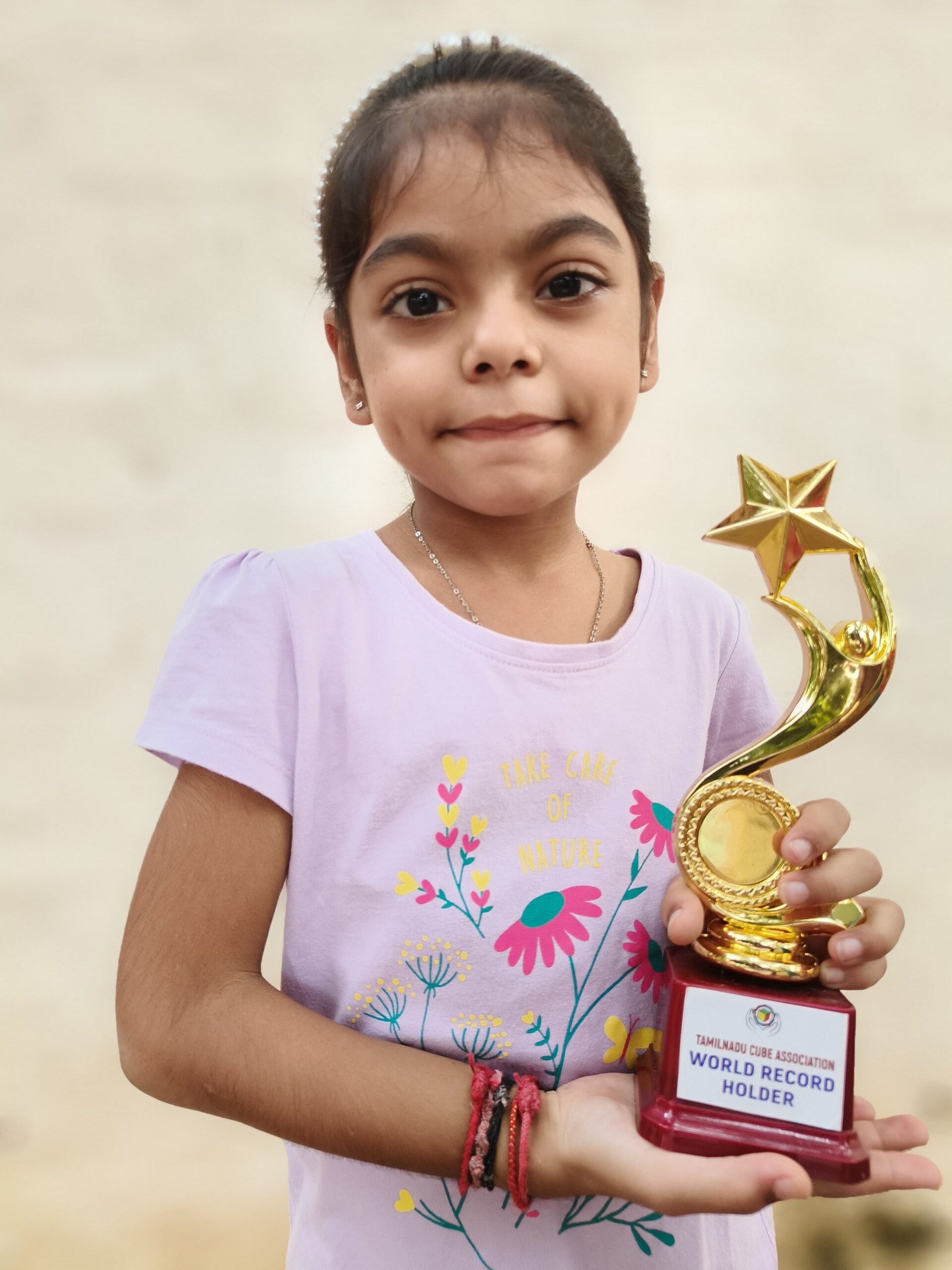 Thea Panchajanyam Thota of class 1 was awarded a trophy for THE INDIA CUBE FEDERATION AND TAMILNADU CUBE ASSOCIATION CONDUCTION on 6.10.25. A 2X2 RUBIKS COMPETITION WHERE 436 PARTICIPANTS SET A WORLD RECORD