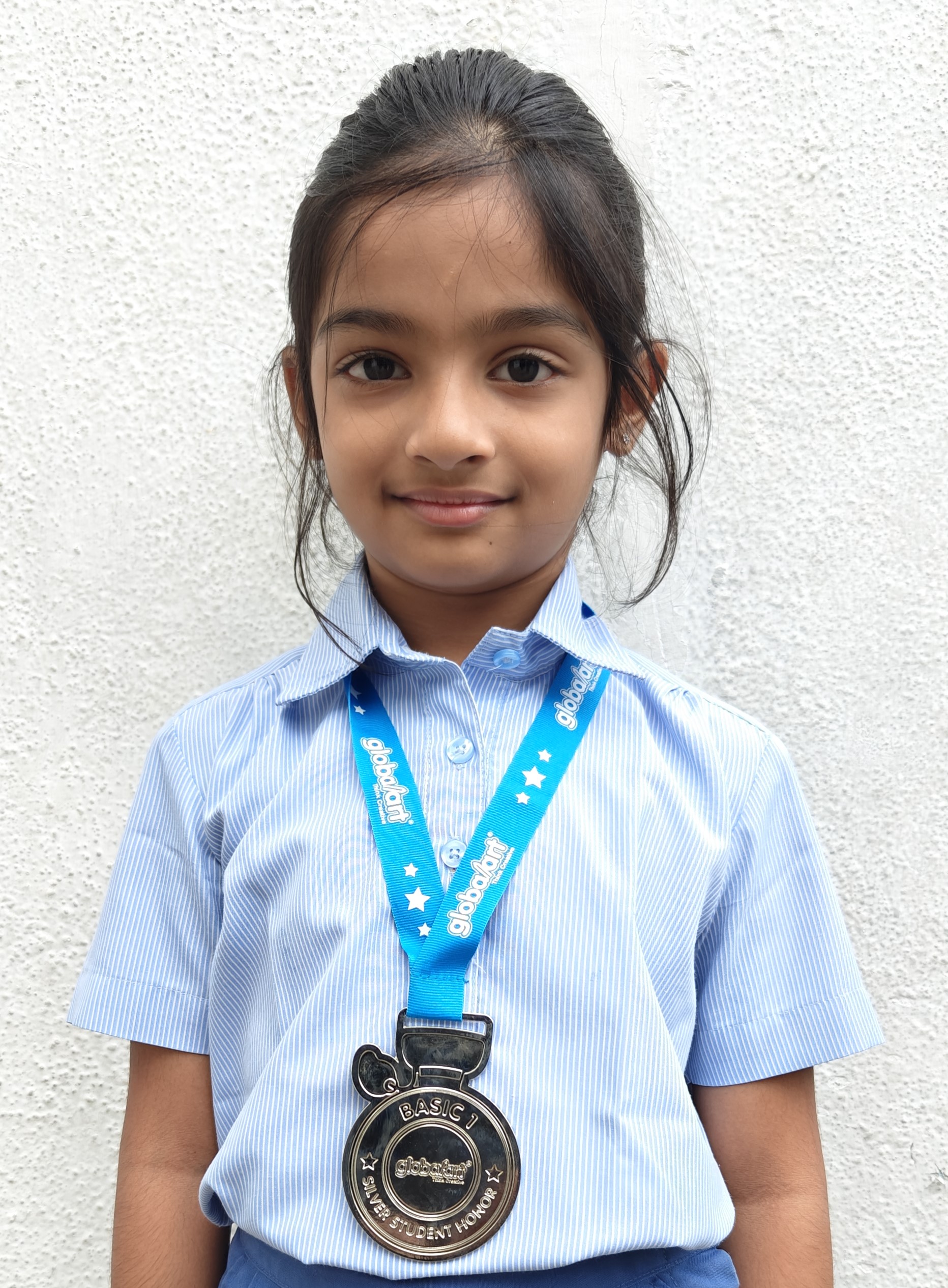 HARSHA VARSHANA D HAS WON A SILVER MEDAL AT THE GLOBAL ART COMPETITION.